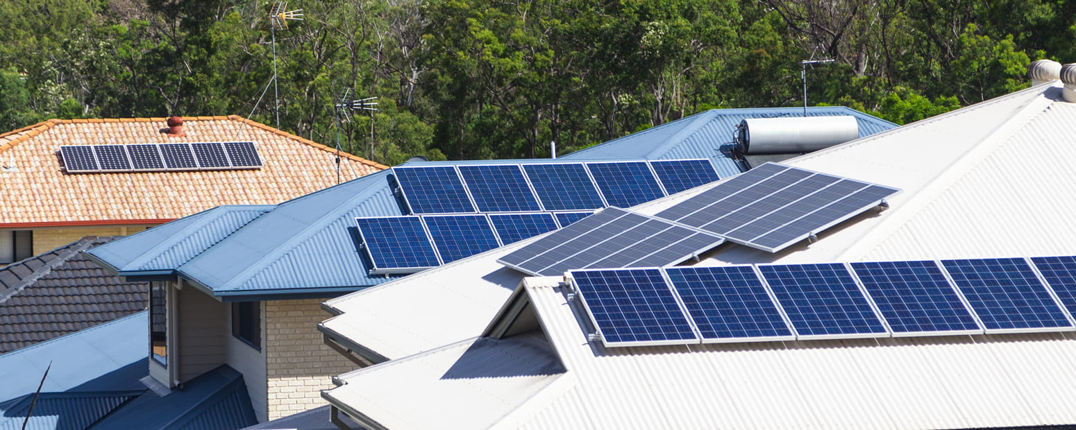 suburban rooftops with solar panels